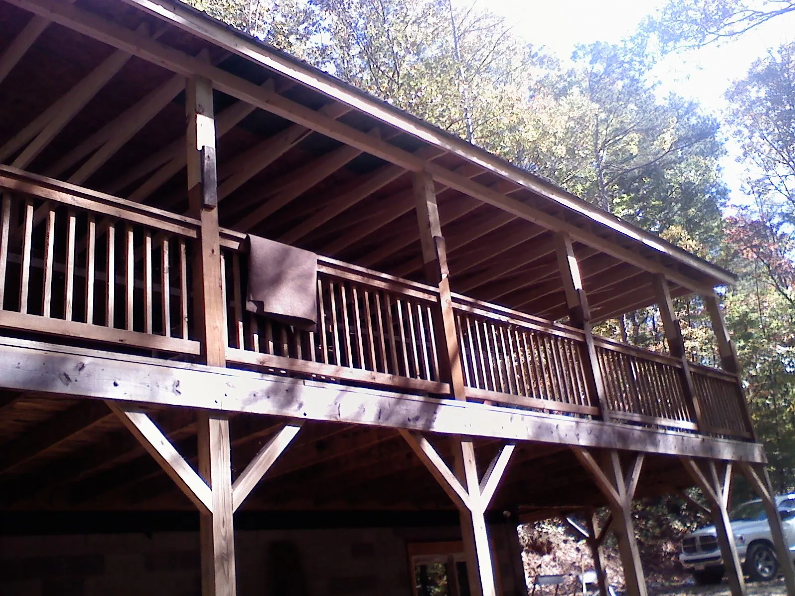 Timber framing under a new elevated porch and deck — Roof Leak Repair in Pawnee by Roofing Brothers